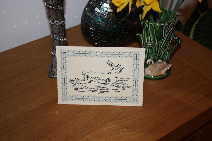 Running rabbit with leaf border