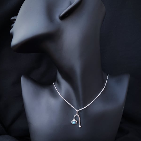 Silver pendant with labradorite