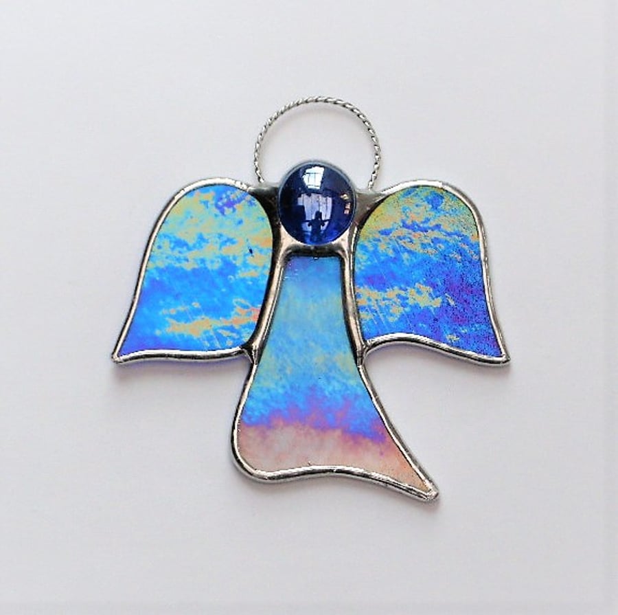 Stained glass (Angel) abstract in two different blues opalecent iridescent glass