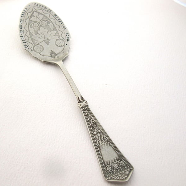 Antique pastry server with hand stamped Shakespeare quote