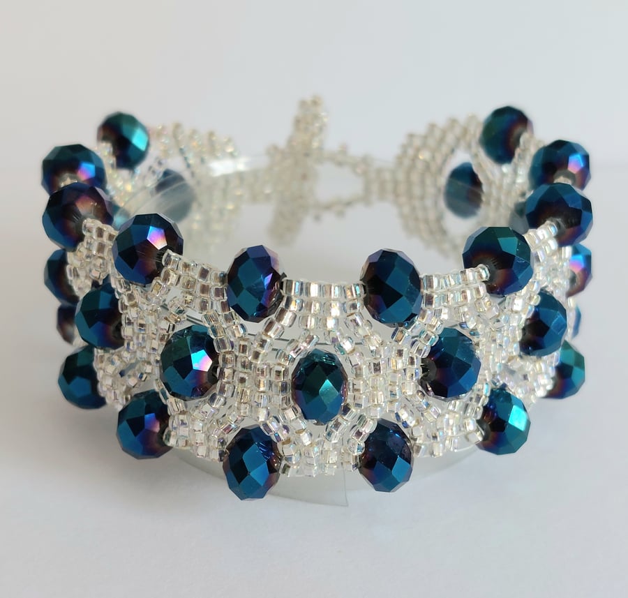 Dark blue crystal and silver-lined glass bead bracelet