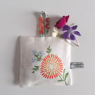 Lavender bag in an upcycled vintage embroidery with orange flower 