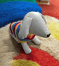 Handknitted rainbow dog coat