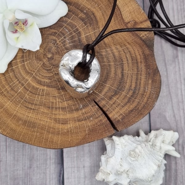 Real hag stone preserved in silver, pendant necklace