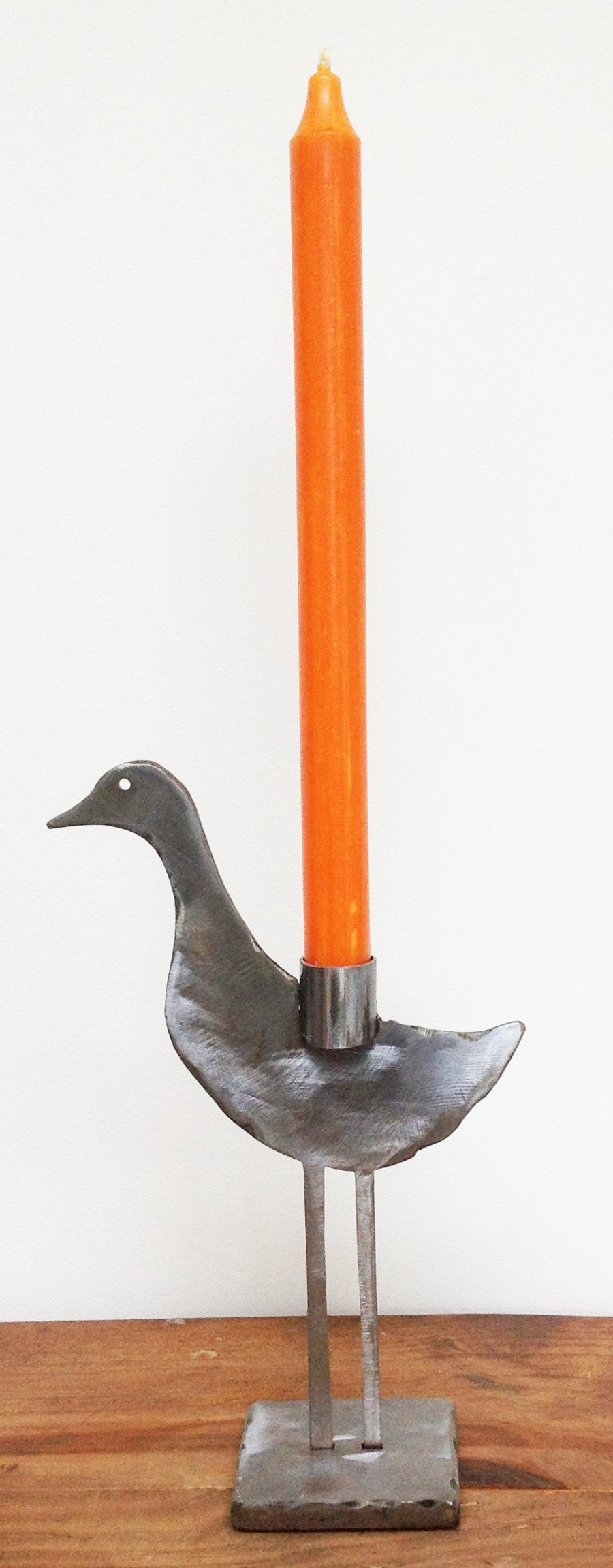 polished sculptured metal duck candle holder