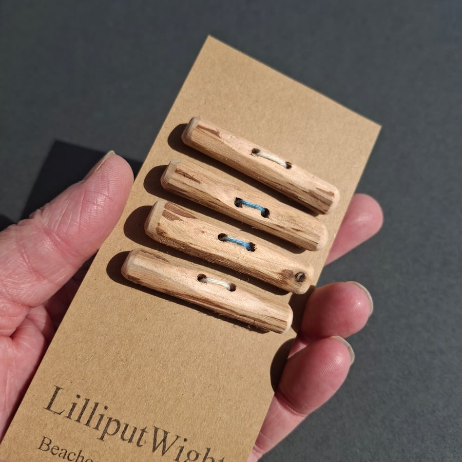 Four driftwood toggle buttons