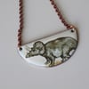 Triceratops bib necklace