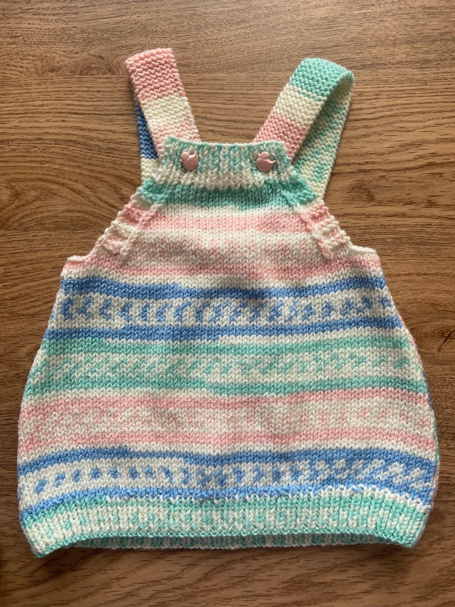 Knitted baby pinafore