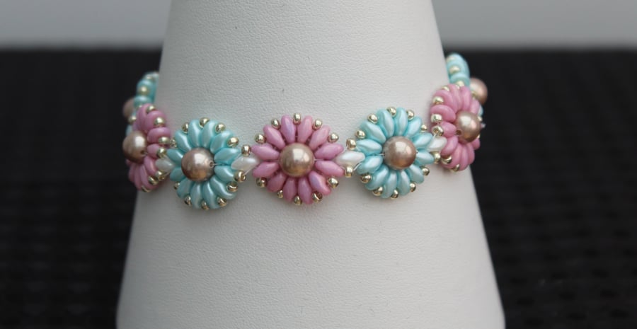 Pink and blue daisy chain bracelet