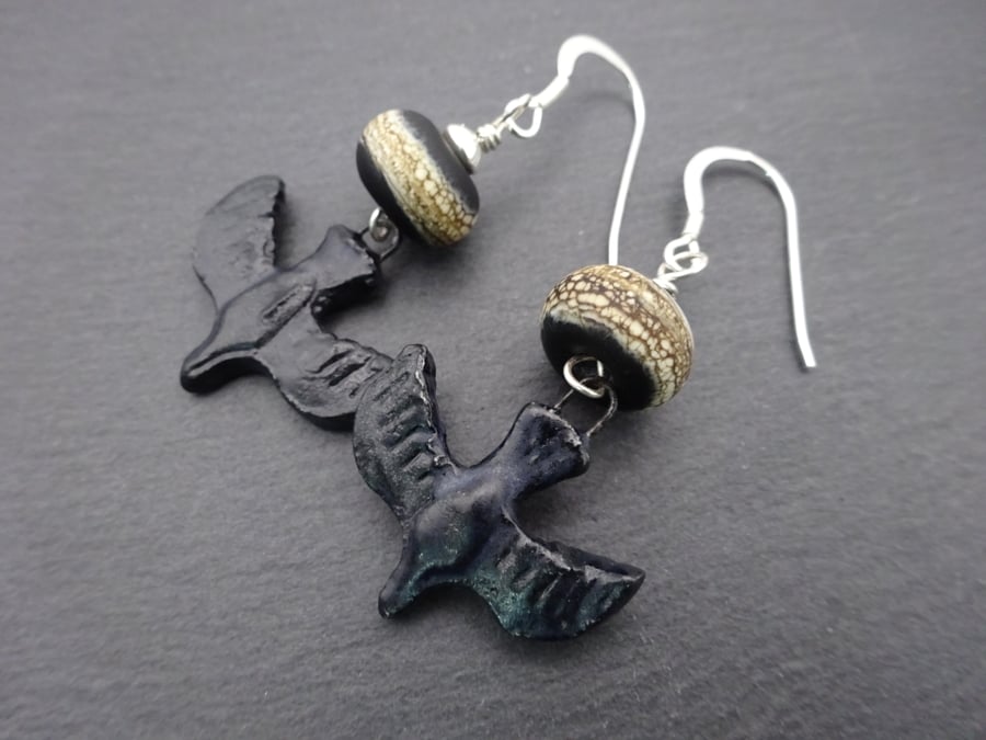 black lampwork glass and ceramic bird earrings
