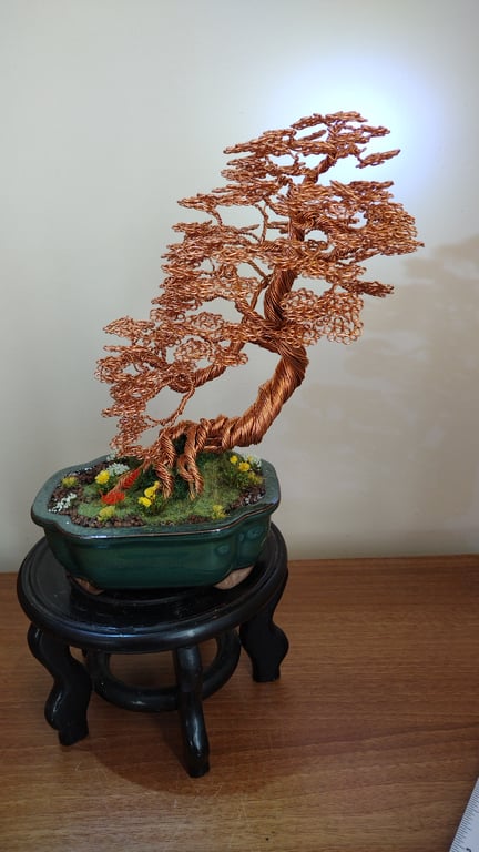 The upright imformal leaning wire bonsai tree 