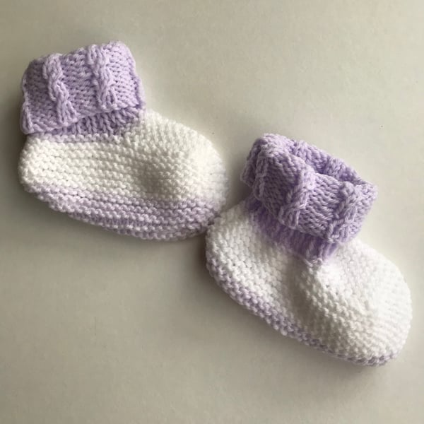 Hand knitted lavender and white baby bootees