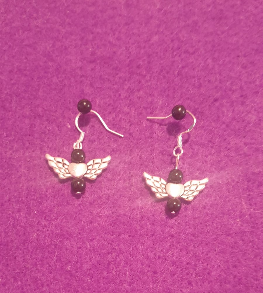 Black winged heart earrings