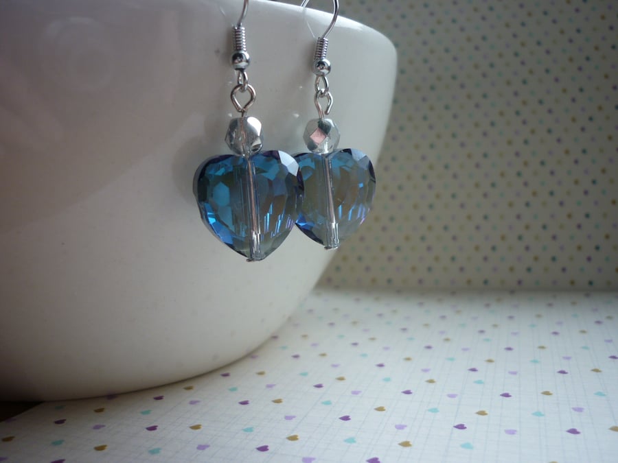 SAPPHIRE BLUE AND SILVER HEART EARRINGS.