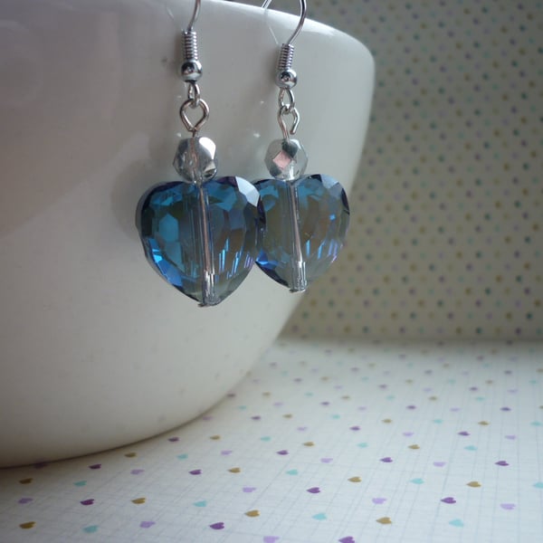 SAPPHIRE BLUE AND SILVER HEART EARRINGS.