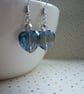SAPPHIRE BLUE AND SILVER HEART EARRINGS. - Image 1