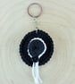 Black Hat Keyring - Crochet hat keyring with white band and black button