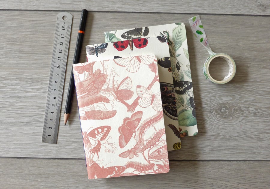 Set of three handbound small A6 notebooks with butterfly paper covers