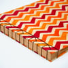 Orange zig zag photo album with Japanese stab binding