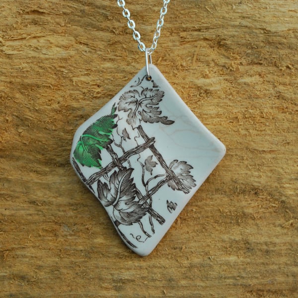 Beach pottery pendant with vine leaves