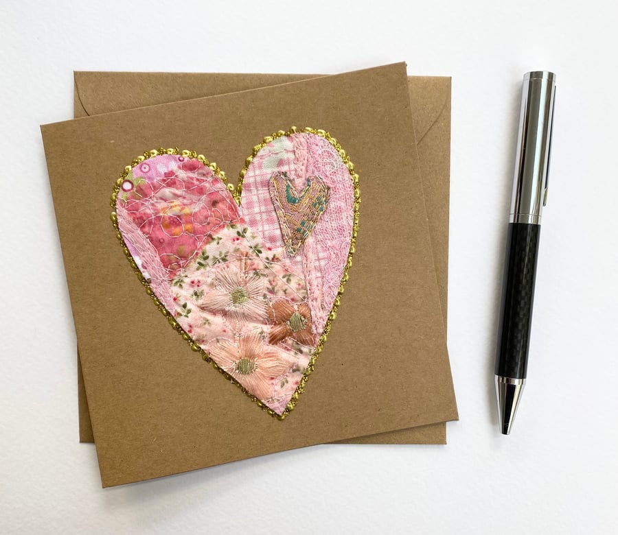Up-cycled embroidered pink heart card. 