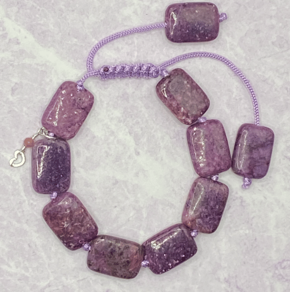 Knotted purple macrame cord bracelet with rectangular lepidolite stones