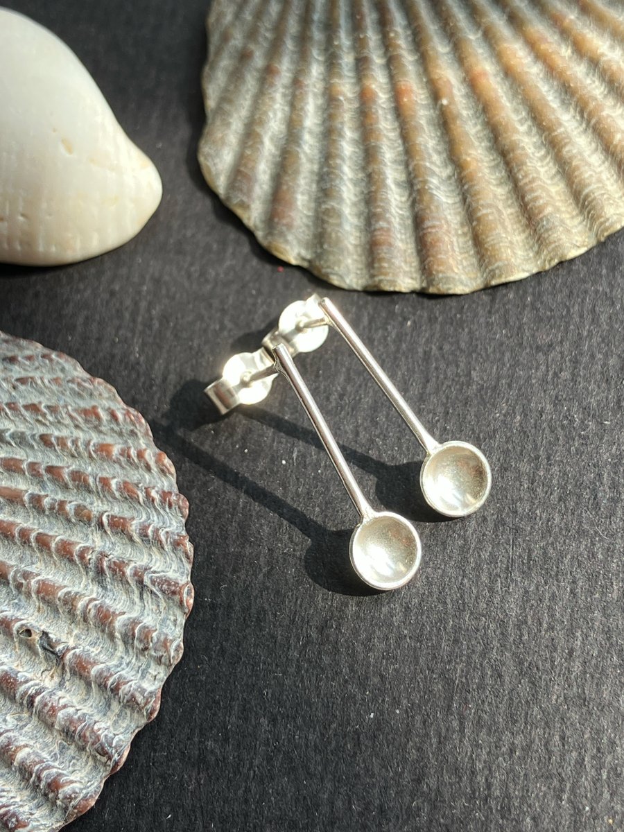 Sterling silver spoon stud earrings.