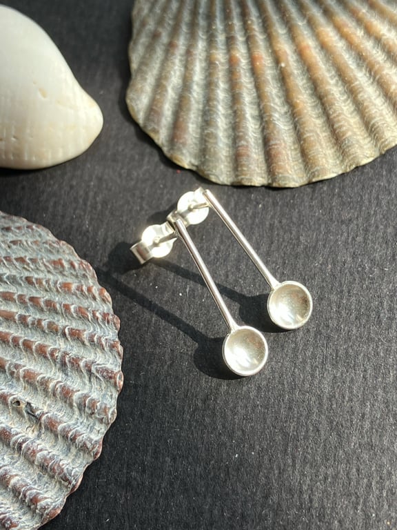 Sterling silver spoon stud earrings.