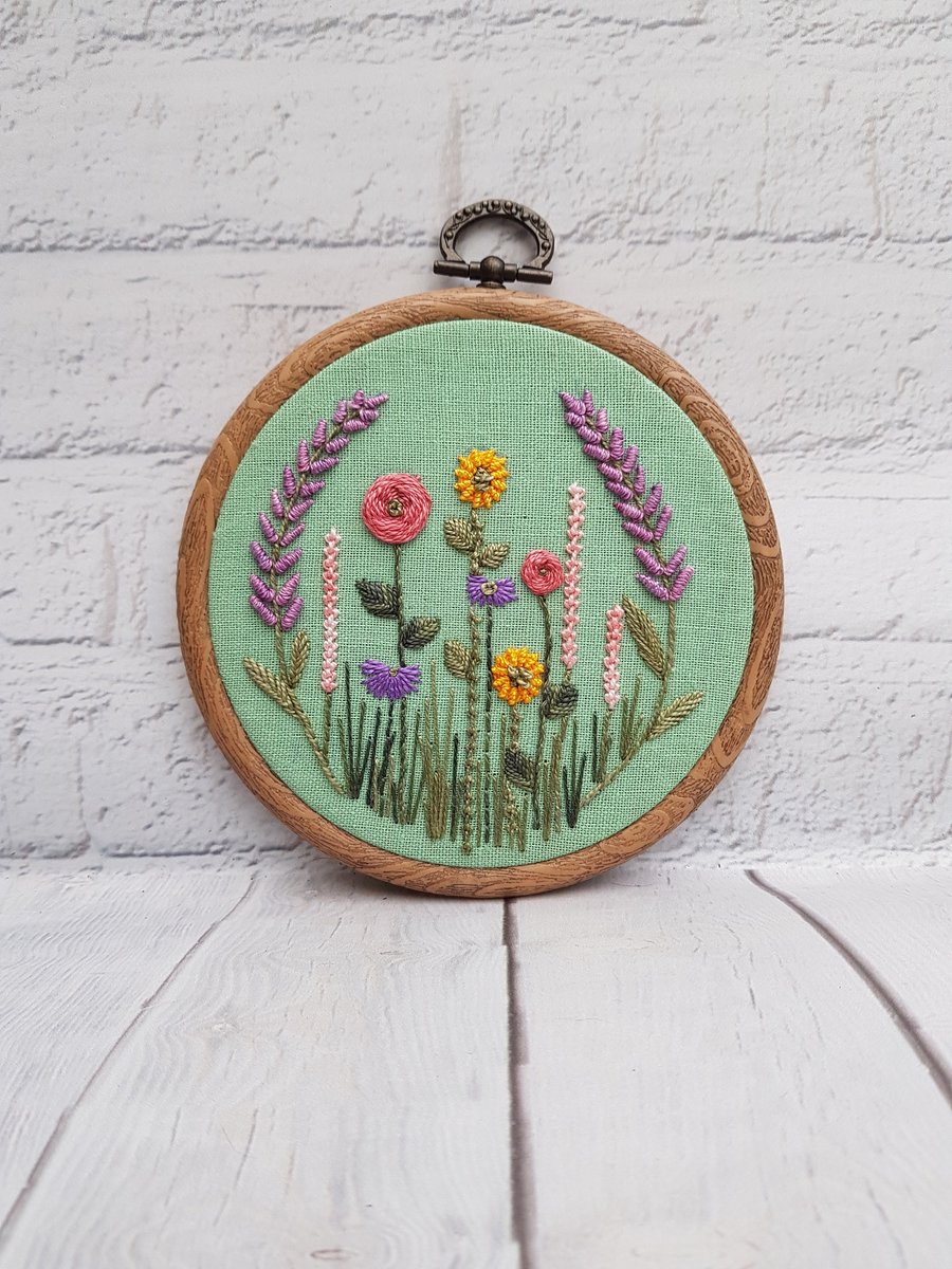 Lavender and Wildflower Hand Embroidery Hoop on Green Linen