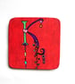 Hand painted letter K wooden coaster