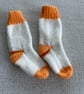 Orange and white baby socks