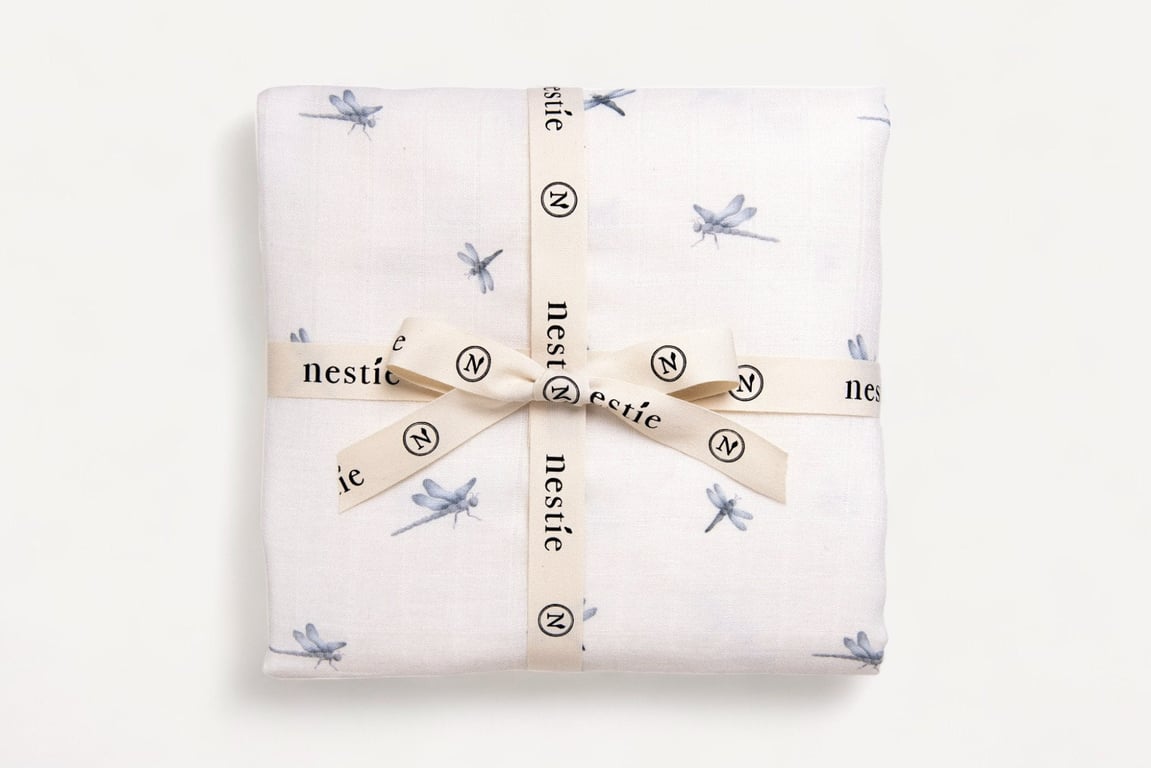 Two Layer Muslin Baby Blanket and Swaddle in our delicate Nestie Waterside Theme
