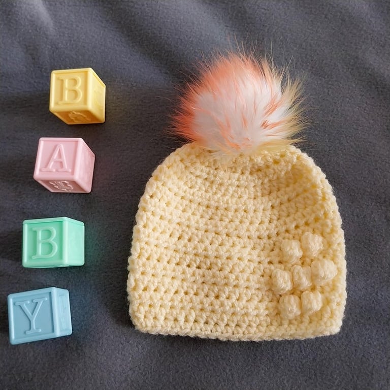 Lemon baby crocheted hat white faux fur pompom with orange yellow & green 