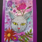 A6 blank greetings card: Grey Cat Amongst Flowers 