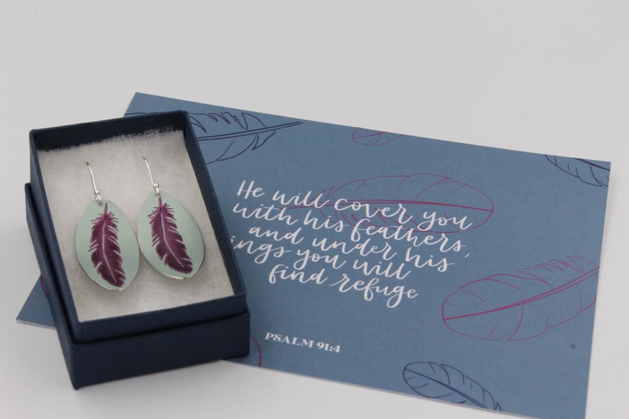 Teal and purple anodised aluminium feather earrings and postcard set