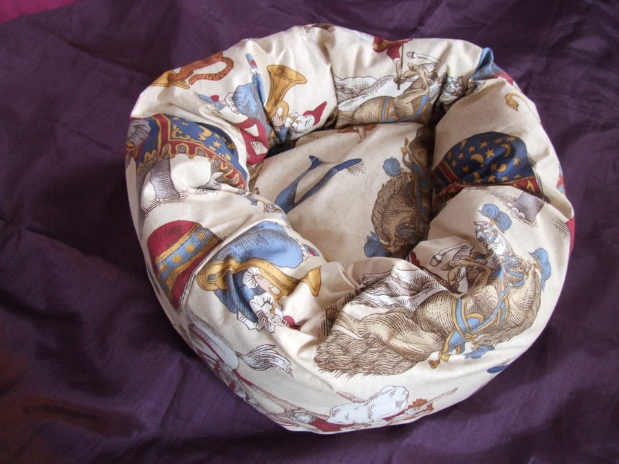 Lovely soft bed for cat or small dog with circus print