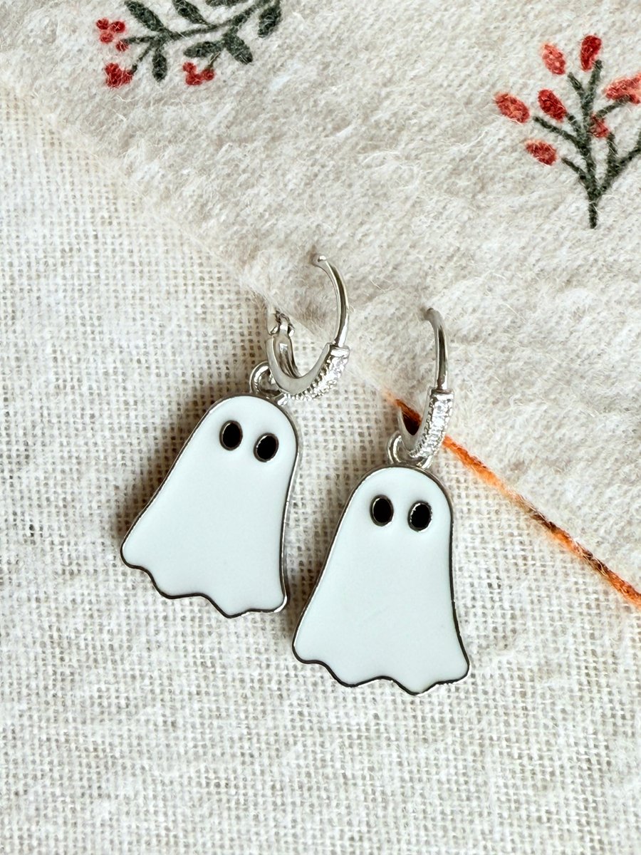Silver hoop dangling ghost earrings 