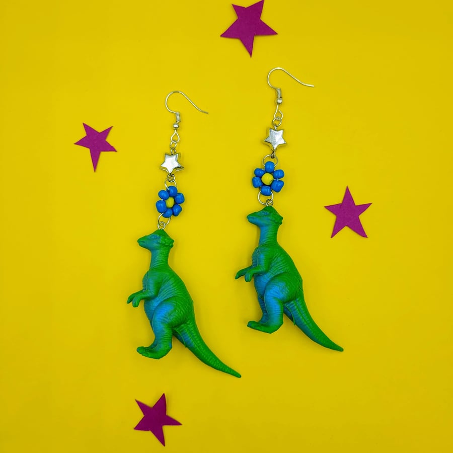 Handmade up-cycled dinosaur earrings with beaded flowers and stars 