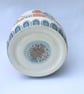 Ceramic hand thrown pot with unique orange and blue decoration - Image 9