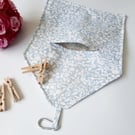 Powder blue and white floral clip on peg bag.