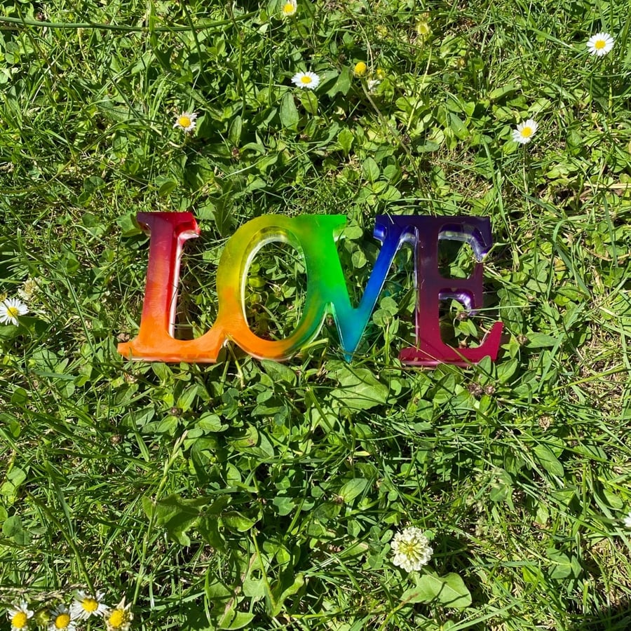 Colours of the rainbow Love word sign, free standing word decoration.