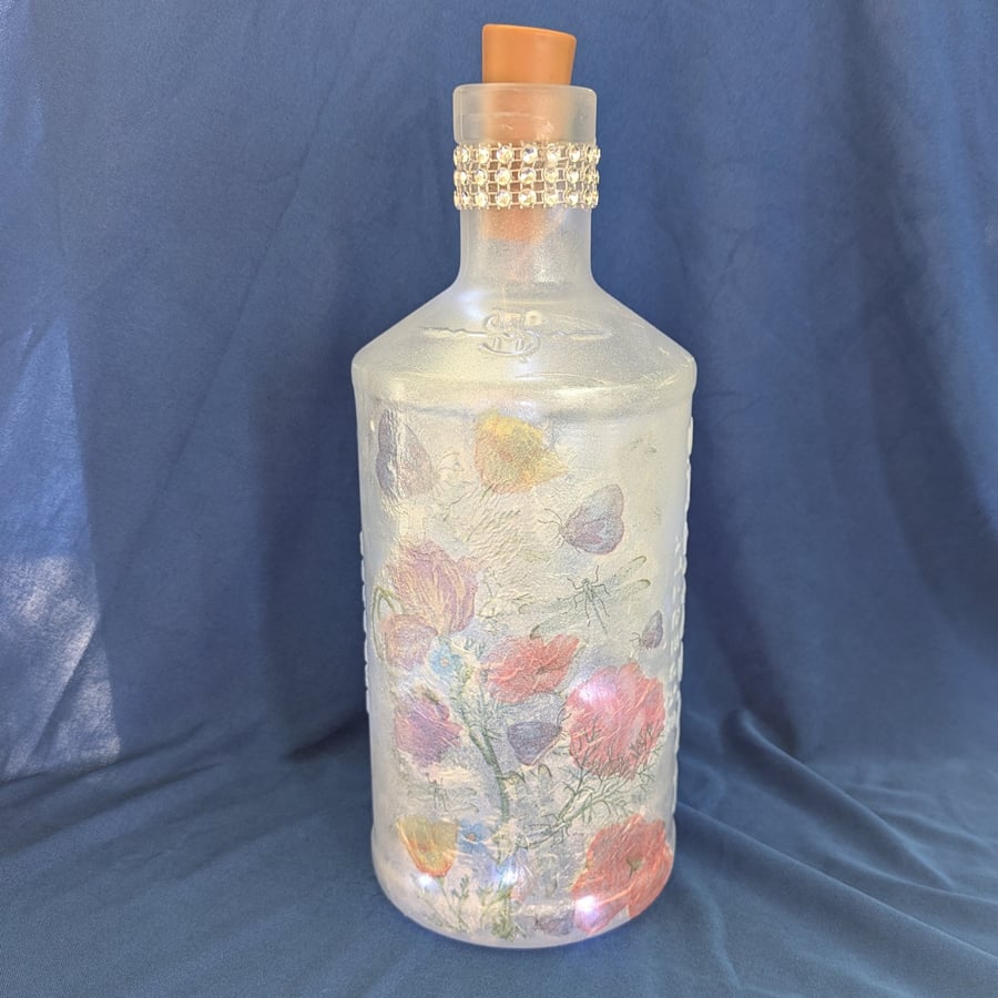 Decoupage light bottle in subtle floral designs