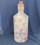 Decoupage light bottle in subtle floral designs