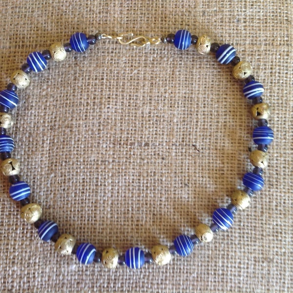Dark blue, purple and bronze bead necklace with beads from Nepal and Africa