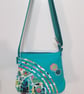 Small turquoise handbag with abstract flowers  - Image 6