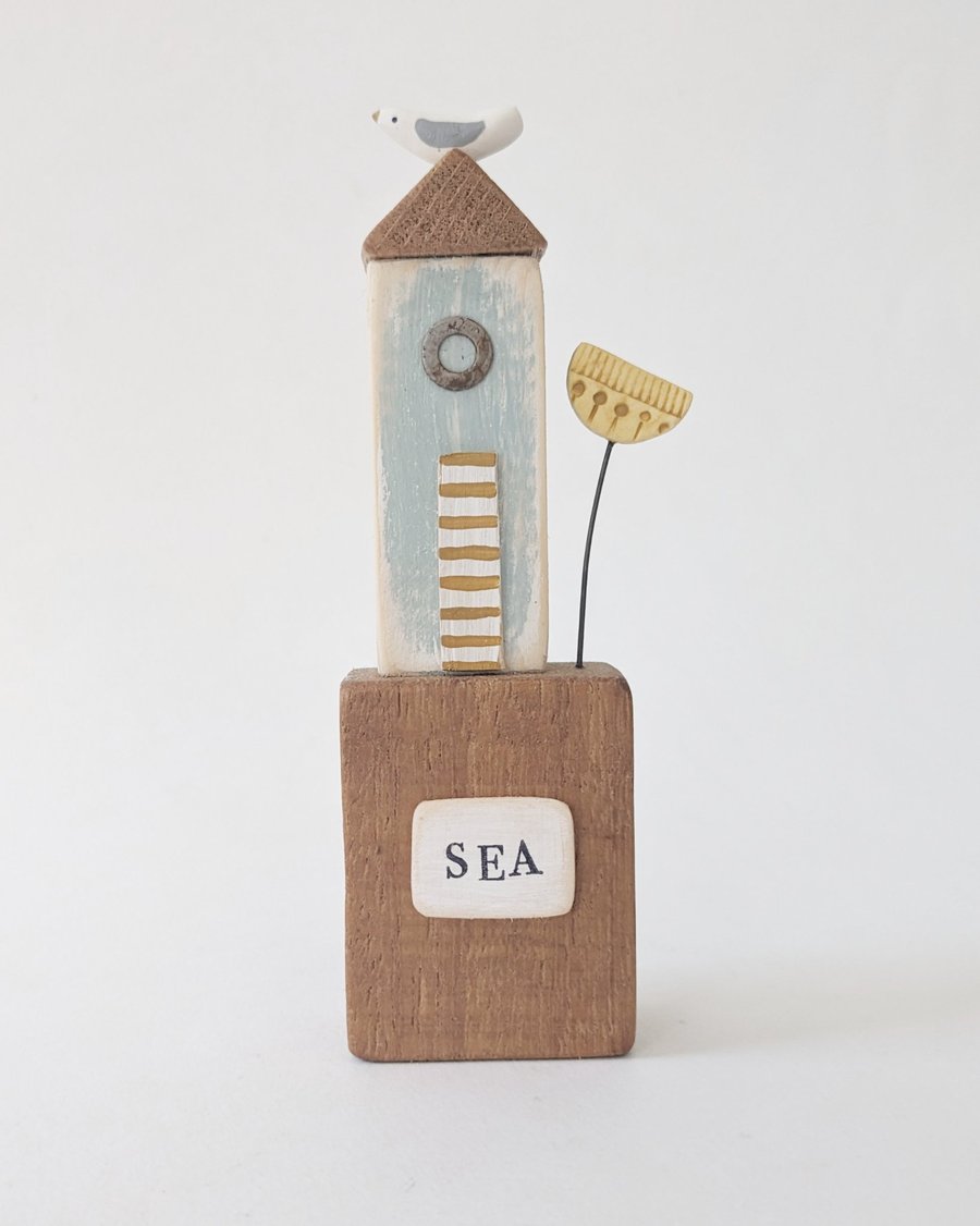 Tall Wooden Sea Hut with Clay Flower and Seagull 'Sea'