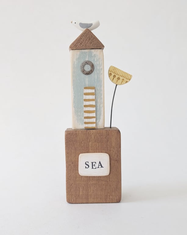 Tall Wooden Sea Hut with Clay Flower and Seagull 'Sea'
