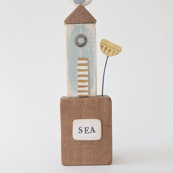 Tall Wooden Sea Hut with Clay Flower and Seagull 'Sea'