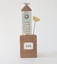 Tall Wooden Sea Hut with Clay Flower and Seagull 'Sea' - Image 1