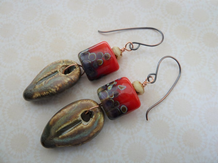 red lampwork and ceramic leaf copper earrings